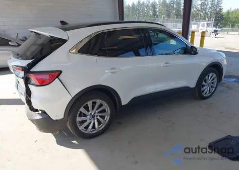 2021 Ford Escape Titanium Hybrid from USA, damaged, VIN 1FMCU9DZ5MUA27459